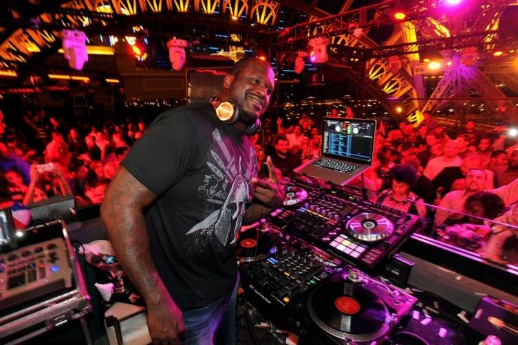 Shaq behind the DJ booth at Chateau Nightclub & Rooftop