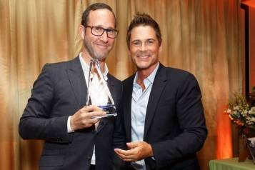 Richard Weitz and Rob Lowe pose with the Legacy Award at  the Bernie Brillstein Golf Tournament on Monday Oct 20th