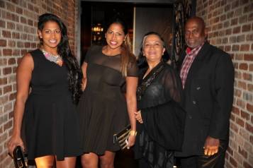 Nadiya and Natalie Anderson pose for a photo with their parents at Andiamo inside the D Las Vegas