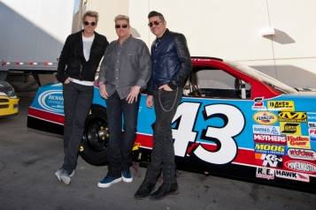02.25.15_Rascal Flatts Pose with Richard Petty Driving Experience Race Car_Patrick Gray, Erik Kabik Photography