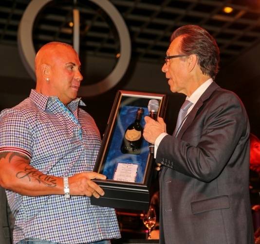 Steve Martorano accepts his Dom Perignon Award of Excellence from Michael Severino at UNLVino's Grand Tasting, 4.18.15