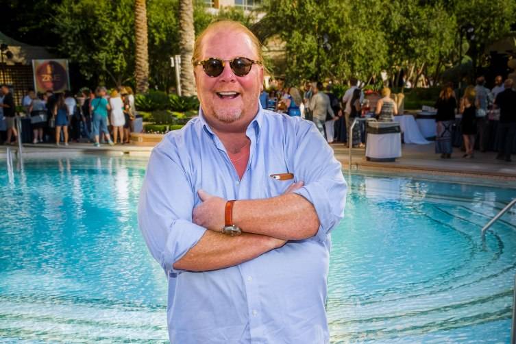 Chef Mario Batali stands poolside at The Palazzo's 7th Annual Carnival of Cuisine