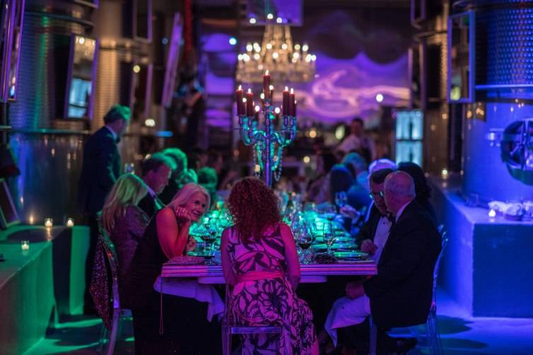 Guests enjoy dinner in the Crystal Cellar at Raymond Vineyards.