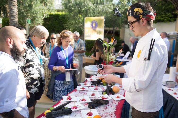 Guests enjoy the fare from SUSHISAMBA at the 7th Annual Carnival of Cuisine at The Palazzo