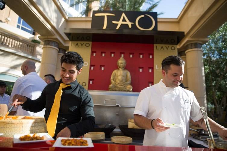 The team from TAO and LAVO prepare plates at the 7th Annual Carnival of Cuisine at The Palazzo