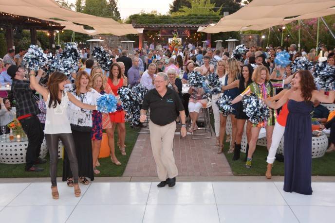 Dr. Joseph Moore of Duke Cancer Institute,  receives a sports stars' welcome.