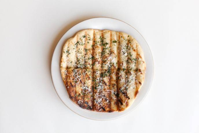 Grilled focaccia w parmesan and herbs