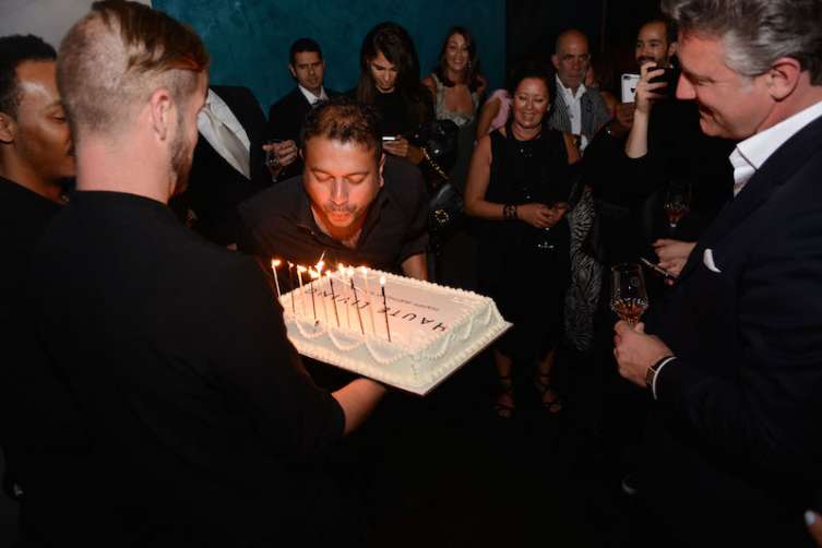 Kamal Blowing out Birthday Candles