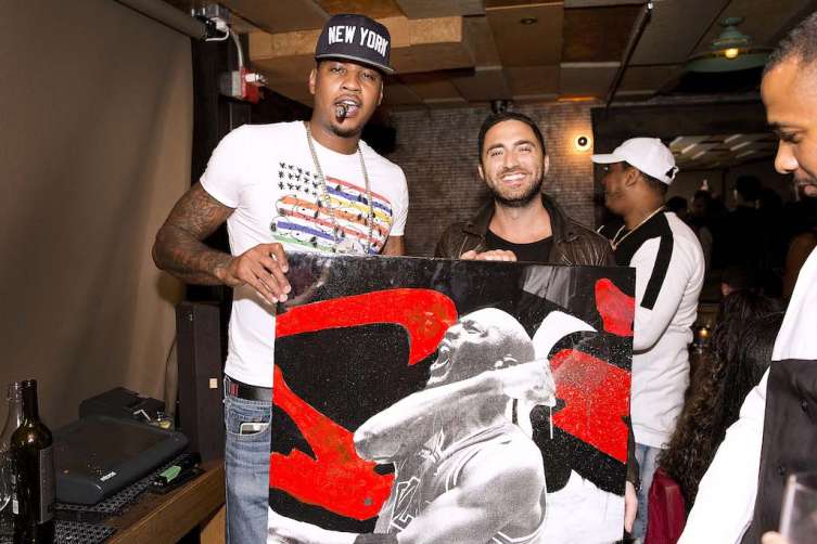 Carmelo Anthony with painting