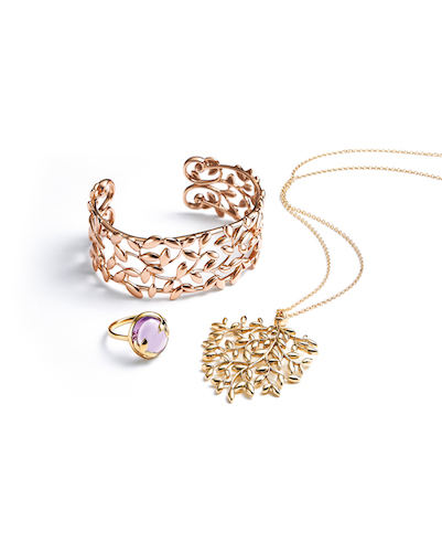 Paloma Picasso Olive Leaf Cuff in 18k Rose Gold, Pendant in 18k Gold, and Ring in 18k Gold with an Amethyst $7,500, $3,300, $1,000