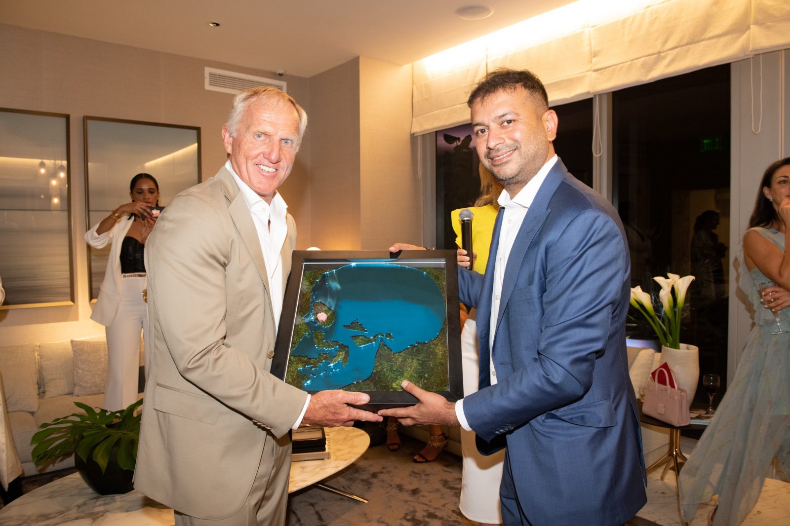 Greg Norman and Kamal Hotchandani