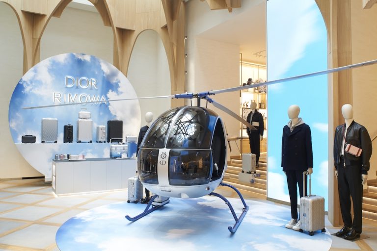 Dior X RIMOWA Capsule Collection Pre-Launches In Champs-Elysées Boutique With Cocktail Party