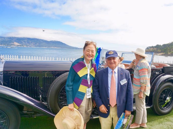 Olivia Decker with Sir Michael Kadoorie, owner of the Best of Show Bentley