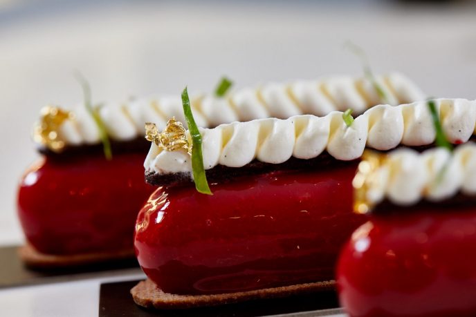 A row of chocolate raspberry fingers, one of many tempting desserts from ONE65 Patisserie & Boutique.