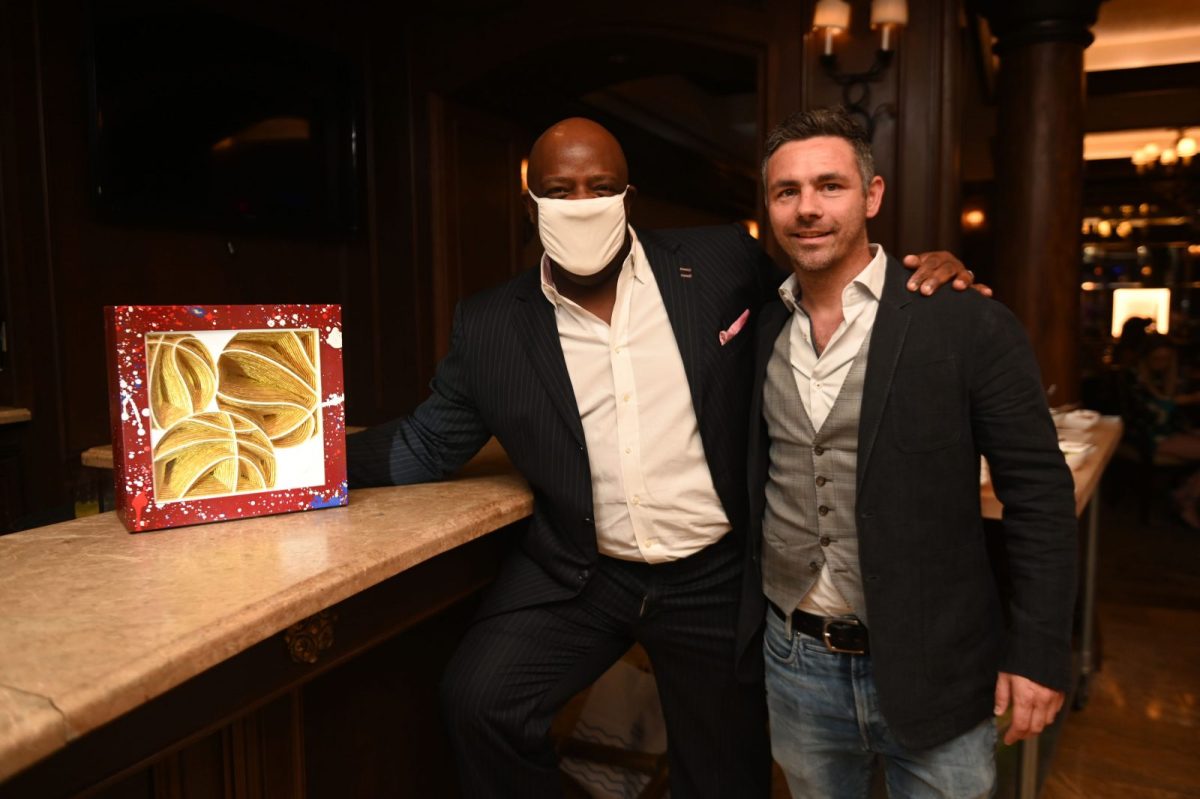 Artist Johnathan Schultz Honors NFL Legend Louis Oliver At Miami Event