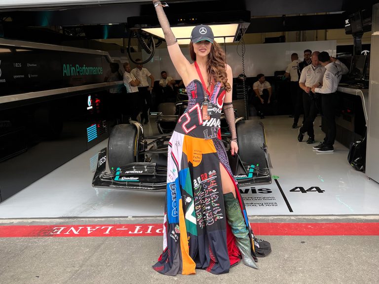 Haute Living Ambassador Radmila Lolly Wears A Bespoke Gown Made Of F1 Driver Jerseys To The Austrian Grand Pri...