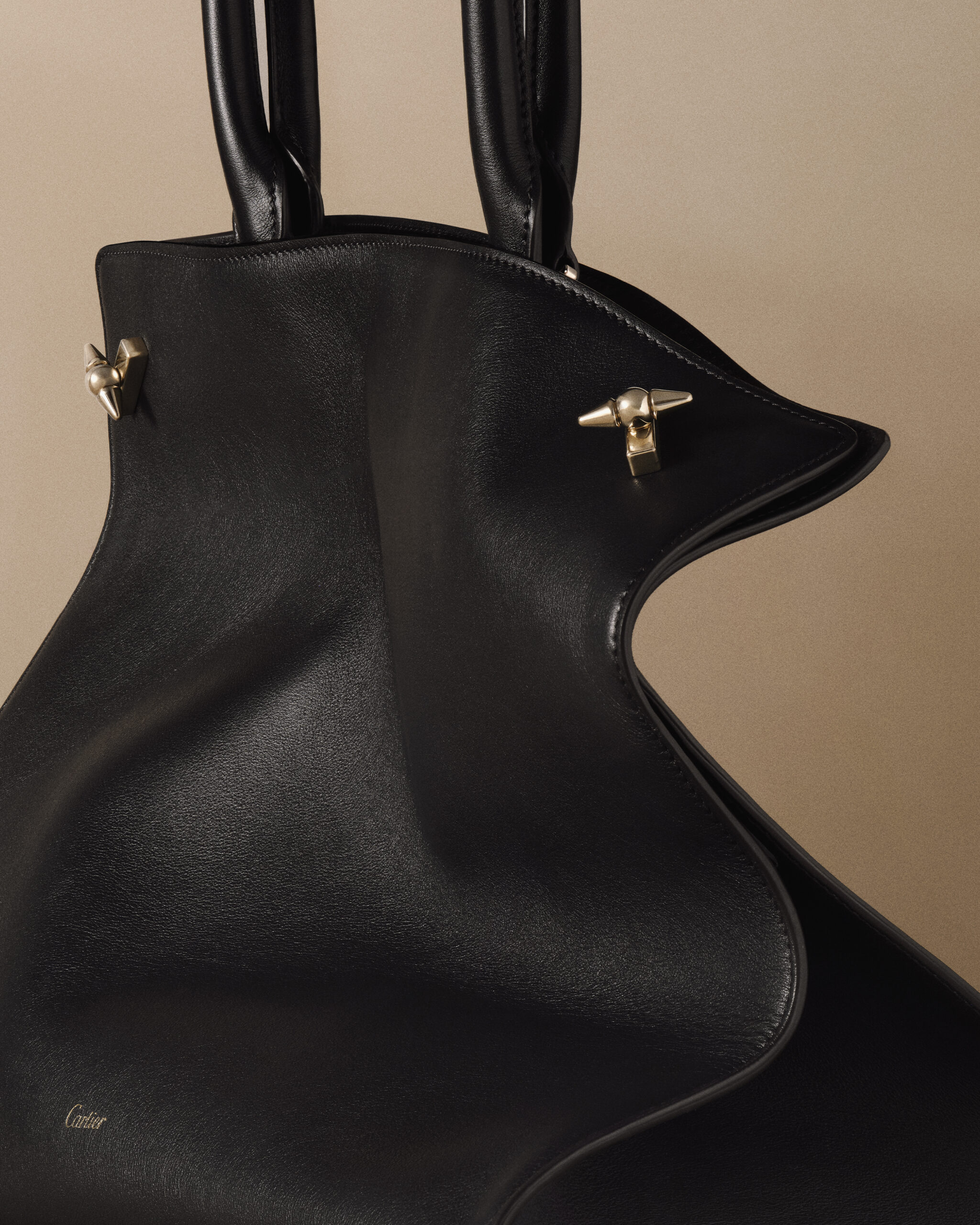 Introducing the Clash de Cartier Bag: The Handbag That Was Designed Like a Piece of Jewelry
