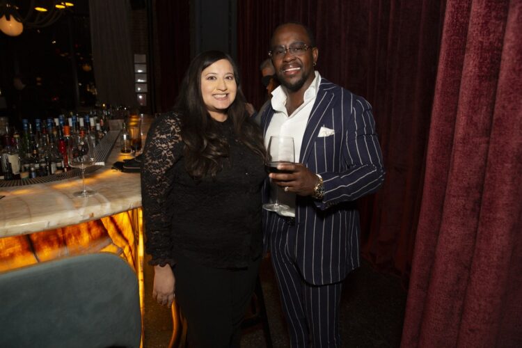 Dr. Purvi Parikh and Peter Gordan at the bar during cocktail hour at Verde New York