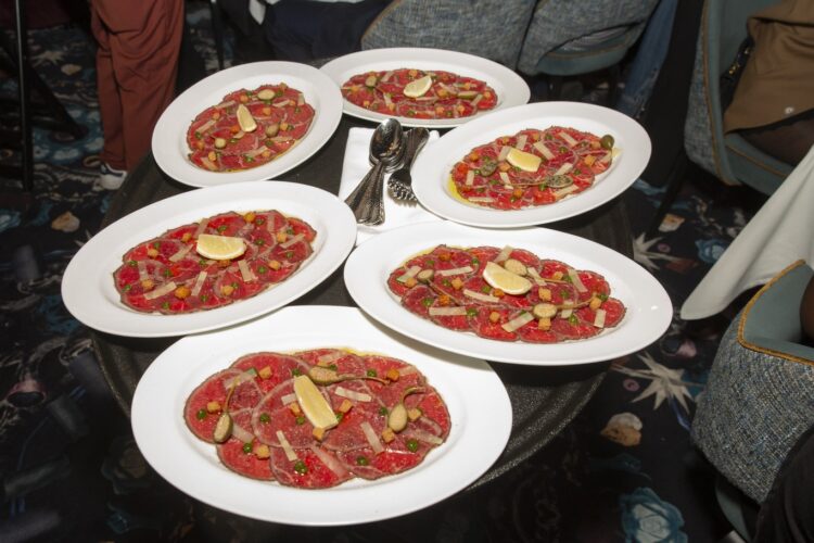 Plates of wagyu carpaccio served at the Haute Living 2 Chainz dinner