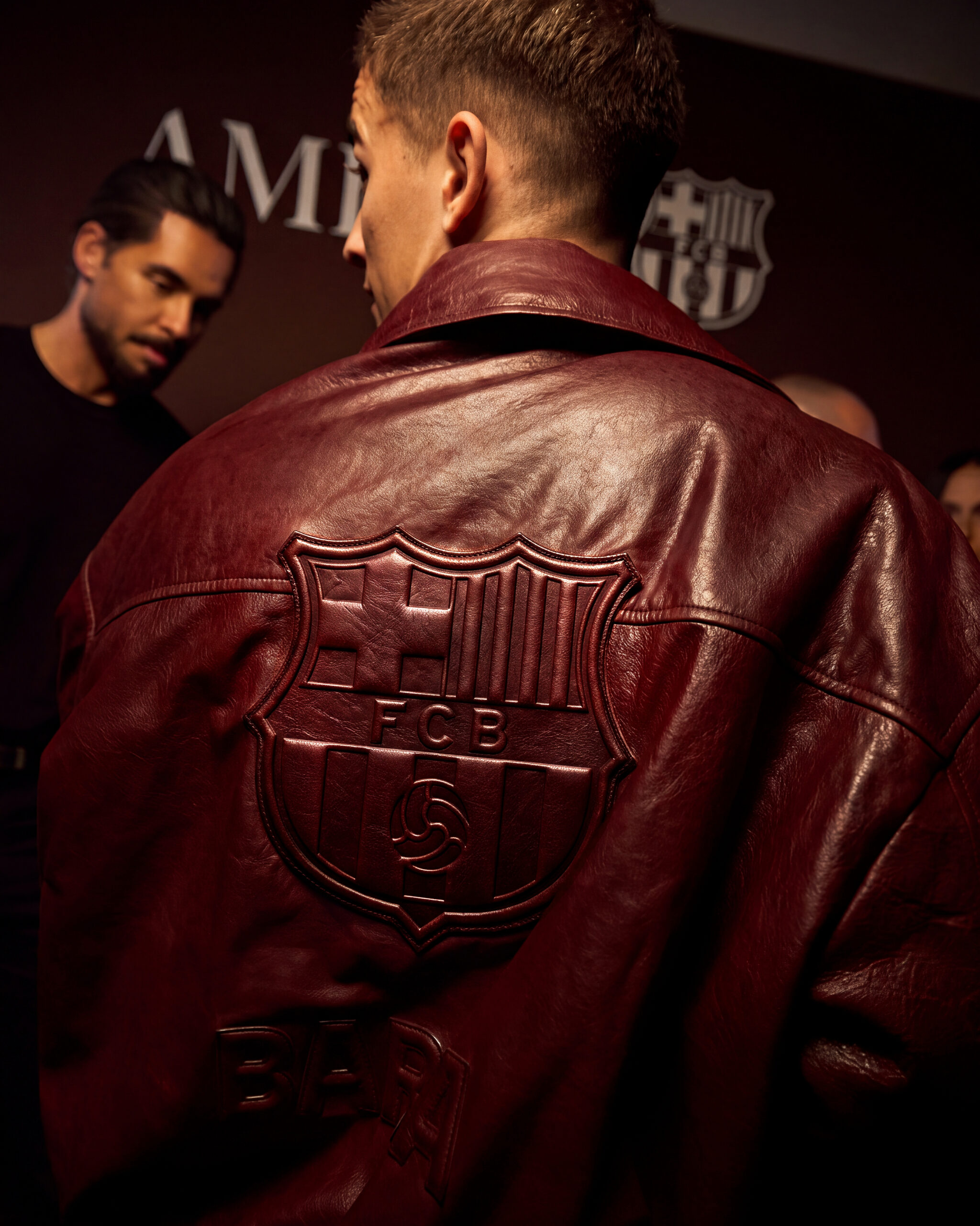 Relief-embossed Barça crest on the back of the garnet lambskin leather blouson from AMIRI FC Barcelona Season Two