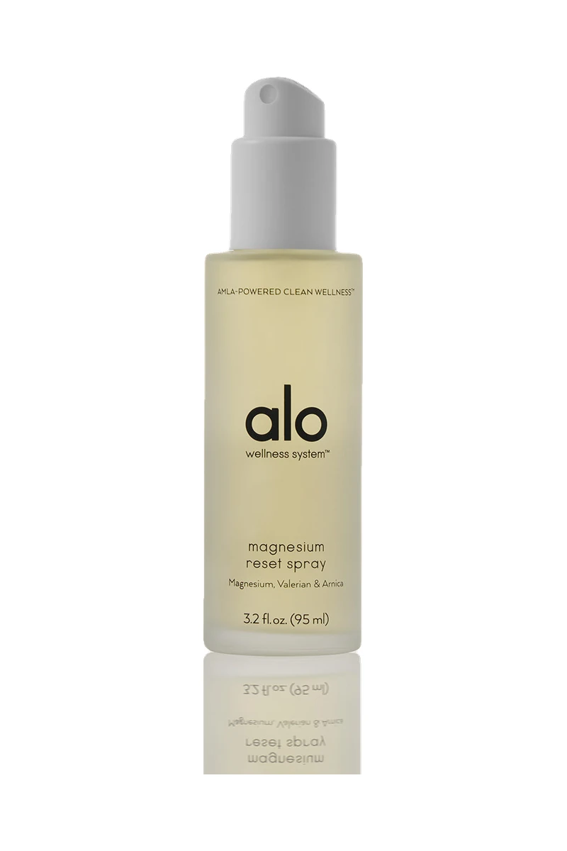 A bottle of ALO Magnesium Reset Spray on a white background, a pick inspired by the ALO Plaza Athénée takeover