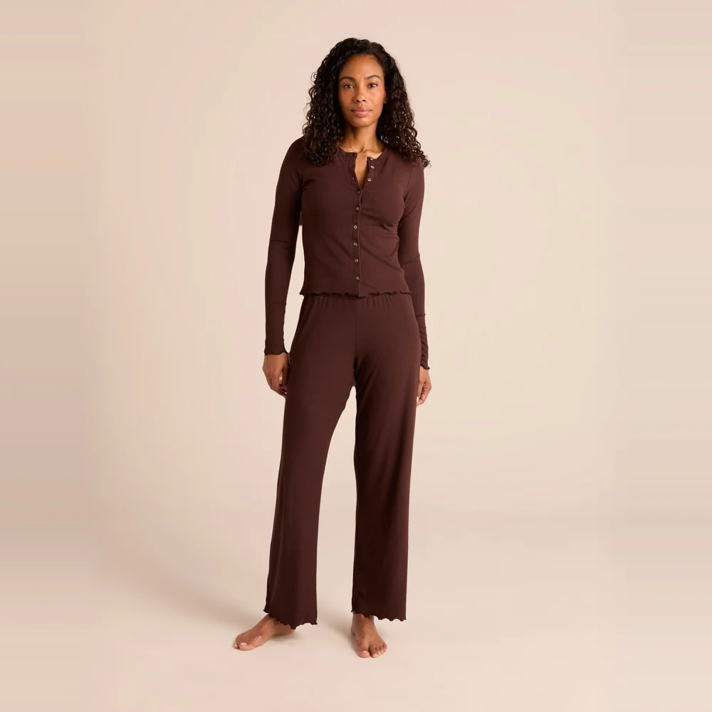Model wearing the Arid Blayne Rib Lasso Pant cooling ribbed pajama pant in Espresso brown