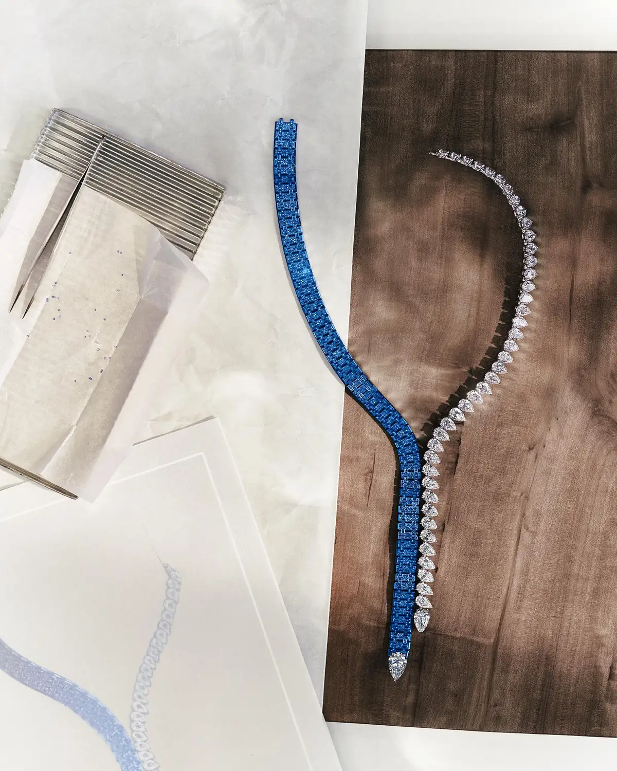 The Audemars Piguet Dream of Joux high jewelry necklace in blue titanium and diamonds on a workbench