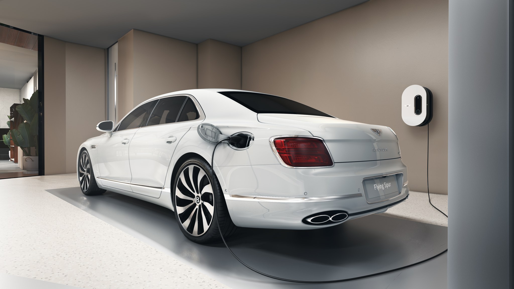 Rendering of a Bentley parked in a private sky garage with EV charging at Bentley Residences Miami