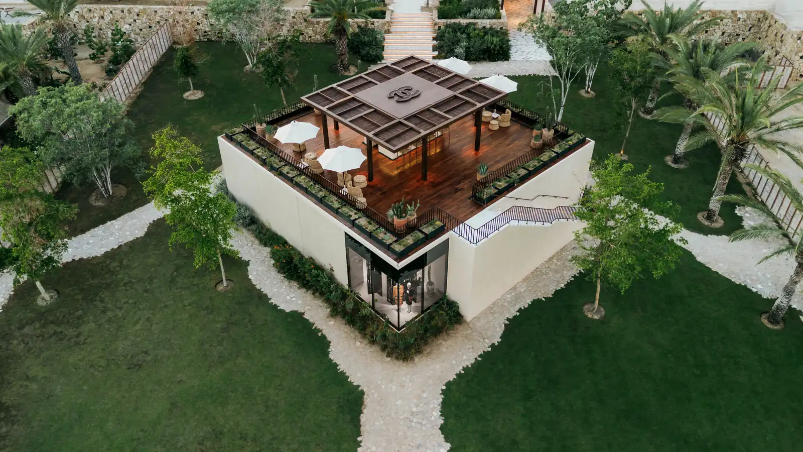 Aerial view of the Chanel Los Cabos boutique and its rooftop terrace amid the gardens of Ánima Village