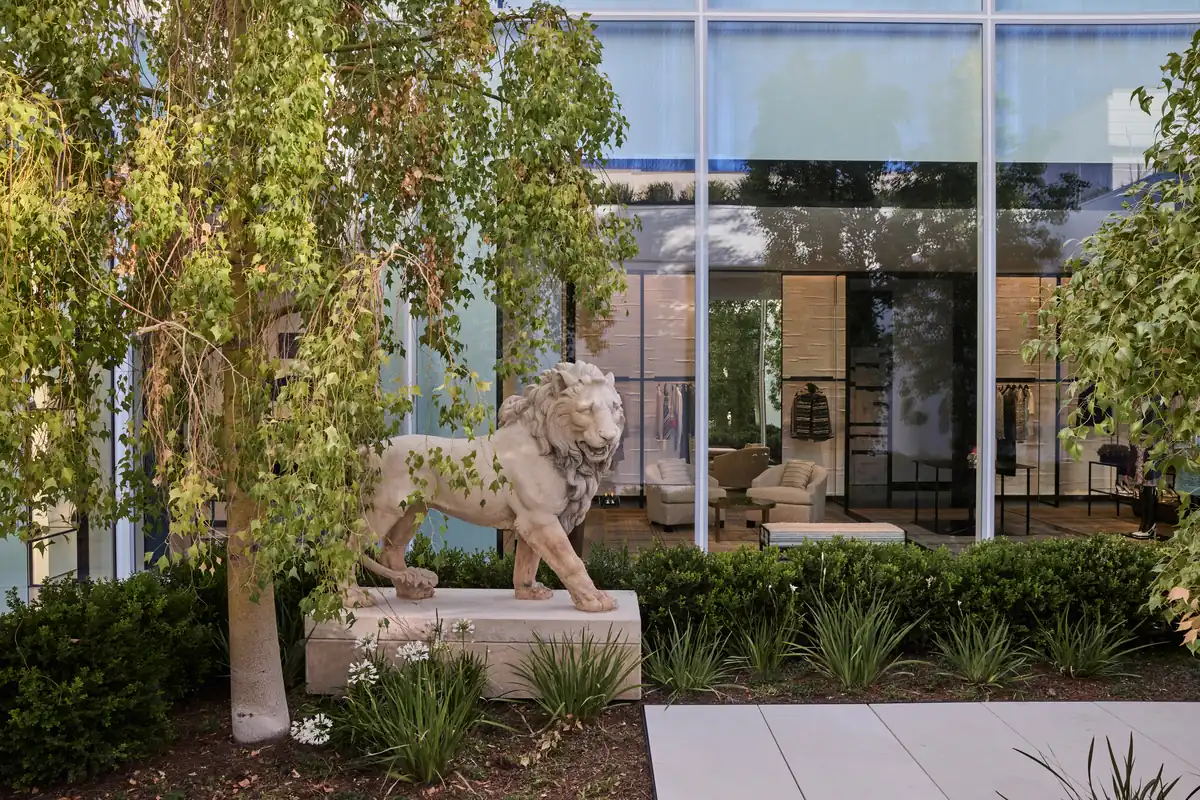 An 18th-century lion sculpture in the central courtyard of the Chanel San Diego boutique