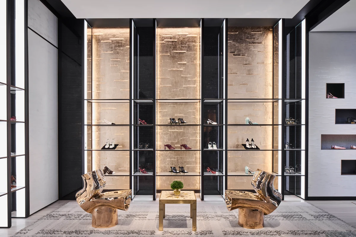 The shoe salon at the Chanel San Diego boutique with sculptural chairs by Voukenas Petrides