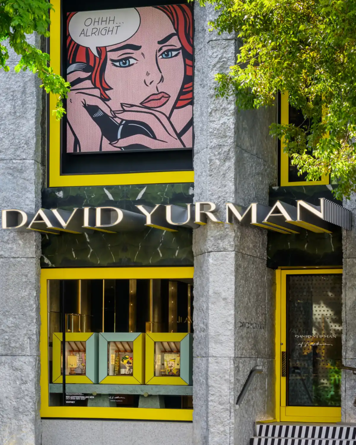 David Yurman Roy Lichtenstein installation at the Miami Design District boutique, with a pop art portrait above the storefront and yellow-framed jewelry windows