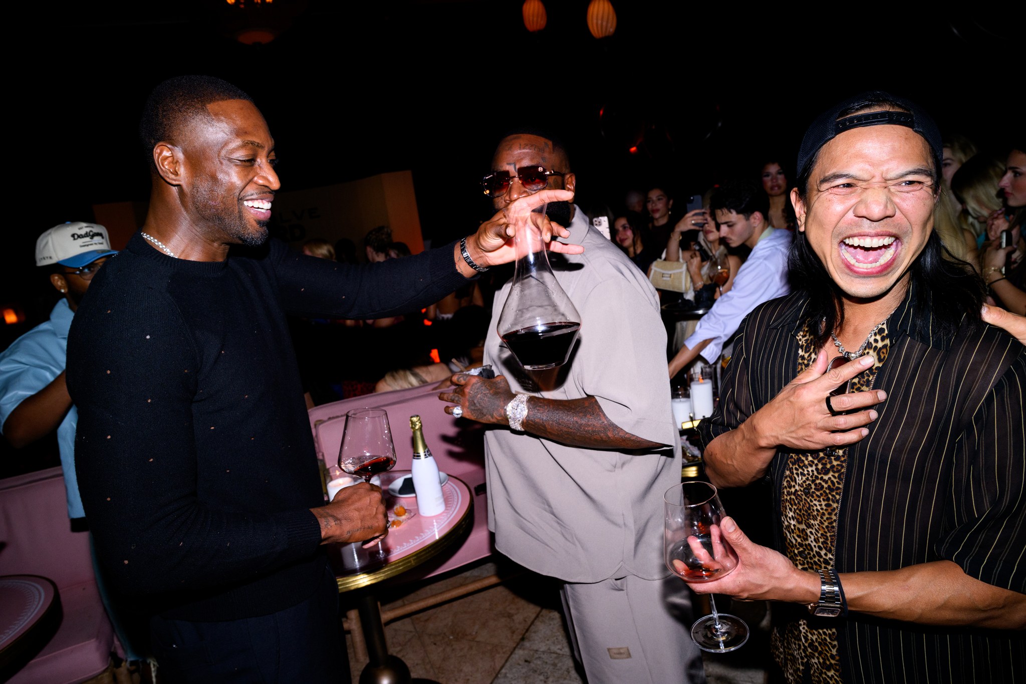 Dwyane Wade, Rick Ross and Michael Mente at the REVOLVE celebration in Miami