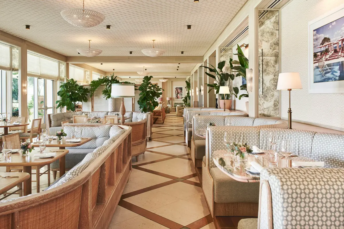 Sunlit dining room at Florie’s, Mauro Colagreco’s restaurant at Four Seasons Resort Palm Beach, a date night restaurant in Palm Beach
