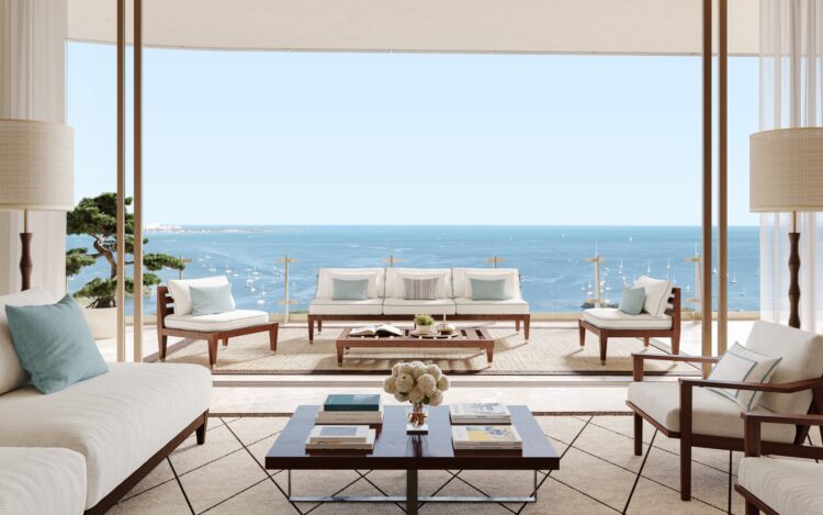 Four Seasons Private Residences Coconut Grove residence living room opening onto a furnished terrace overlooking Biscayne Bay