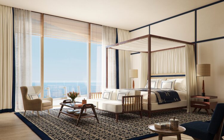 Four Seasons Private Residences Coconut Grove primary bedroom with a canopy bed and floor-to-ceiling water views