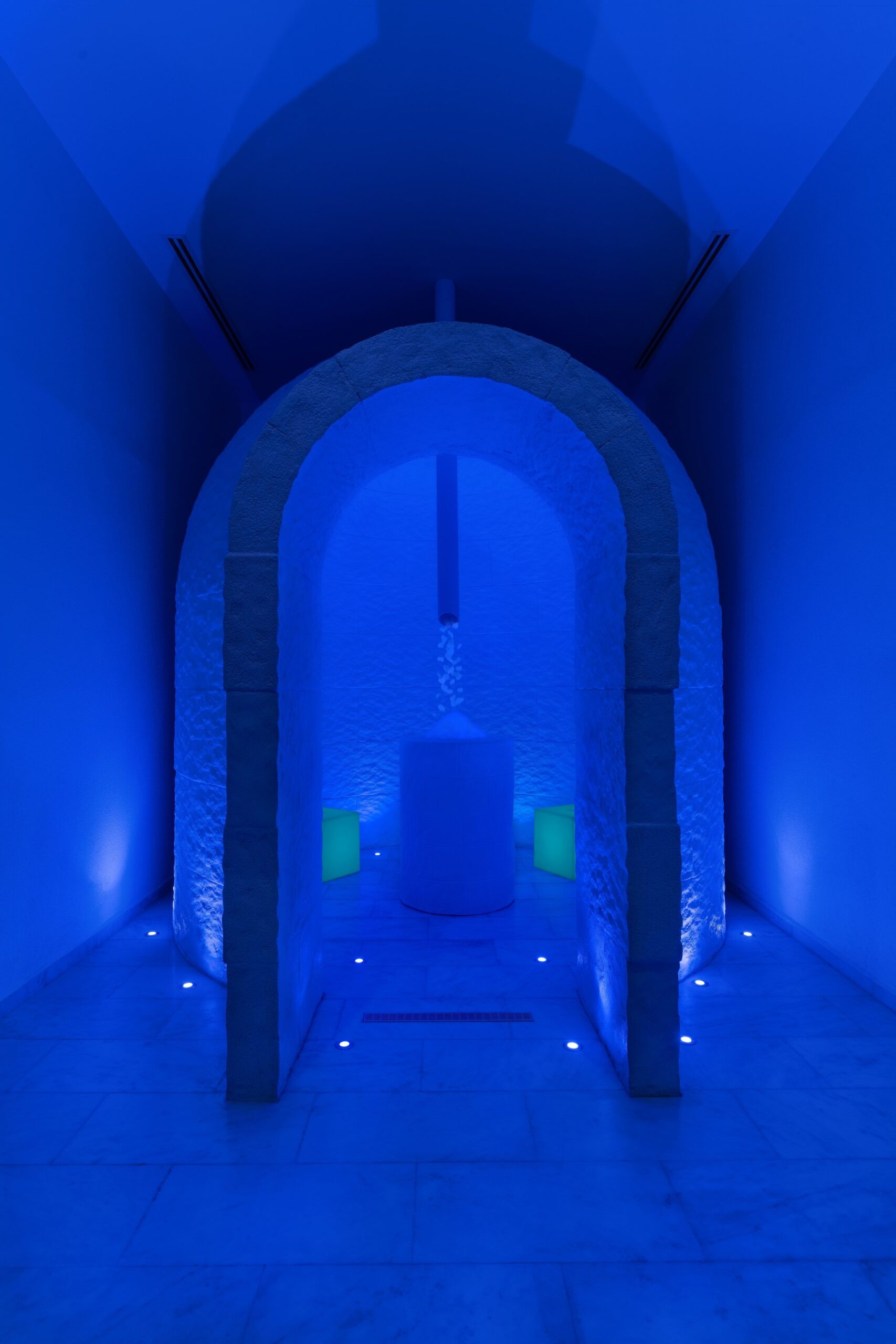 A blue-lit room at Hürrem Hammam