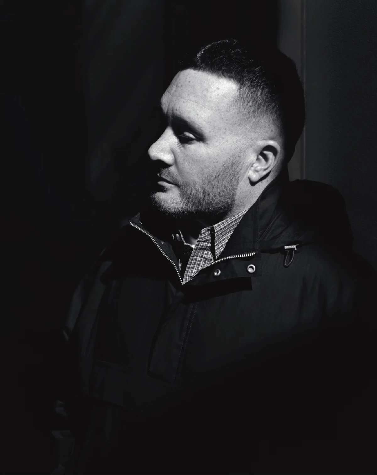 Black-and-white portrait of Kim Jones in profile, who is launching his own label for fall 2027