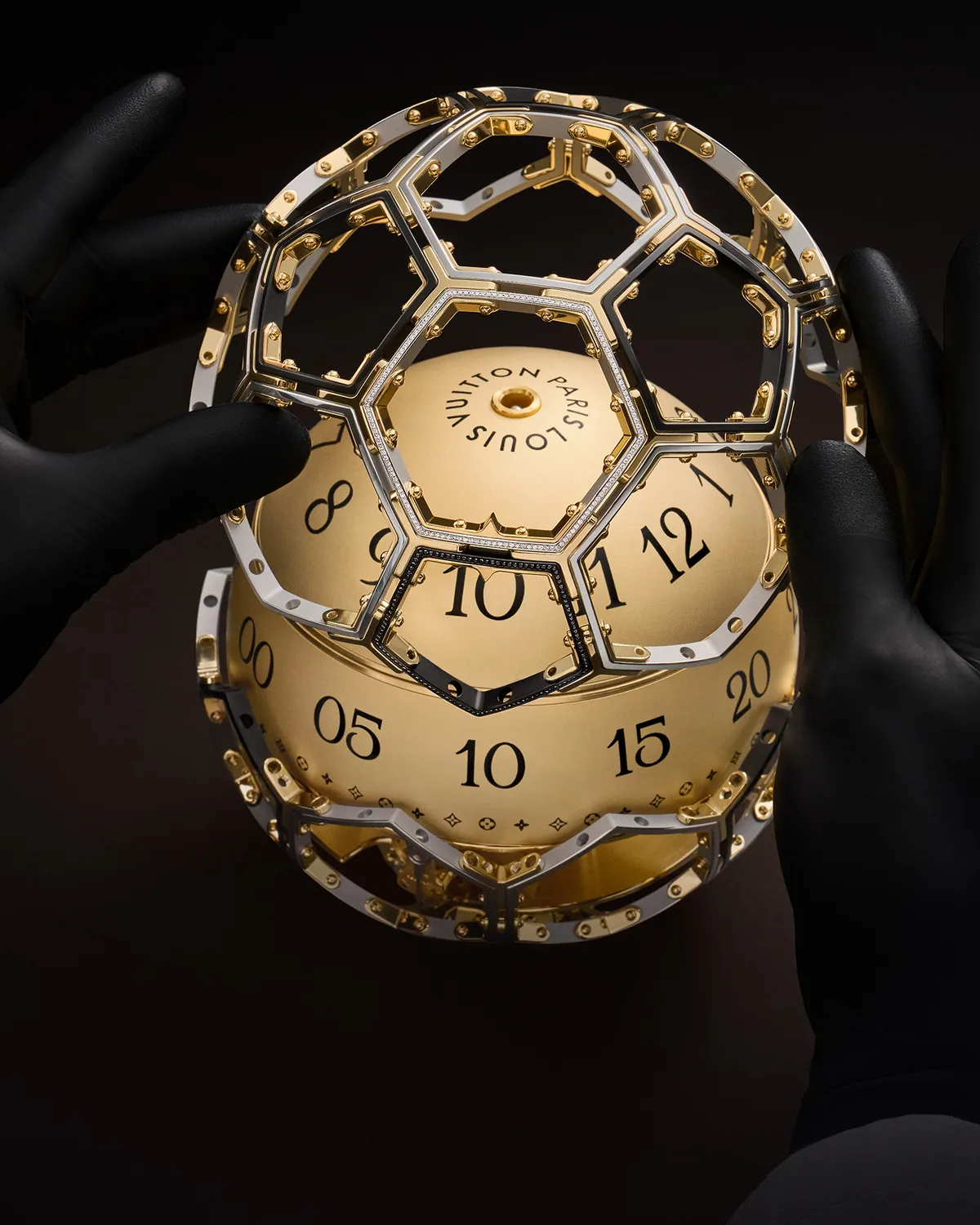 Louis Vuitton for UNICEF: Unity Time Object openwork structure being assembled
