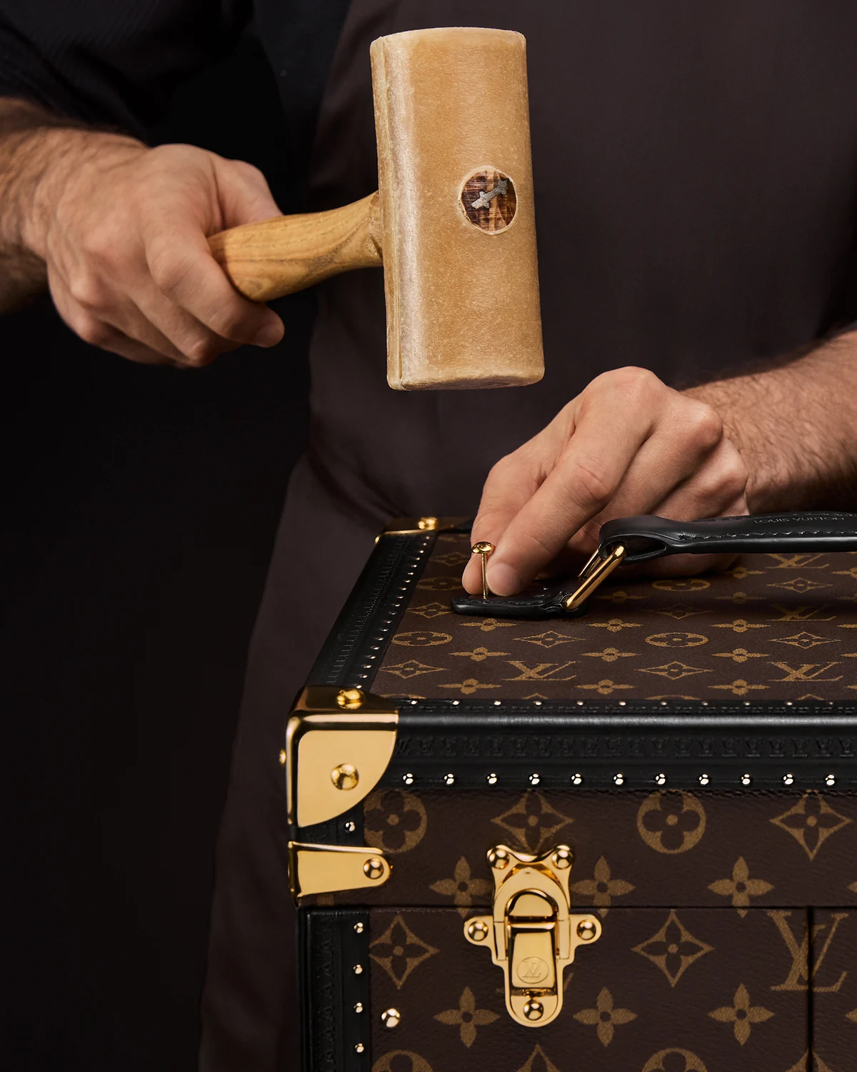 Louis Vuitton for UNICEF: artisan working on the Unity Time Object trophy trunk