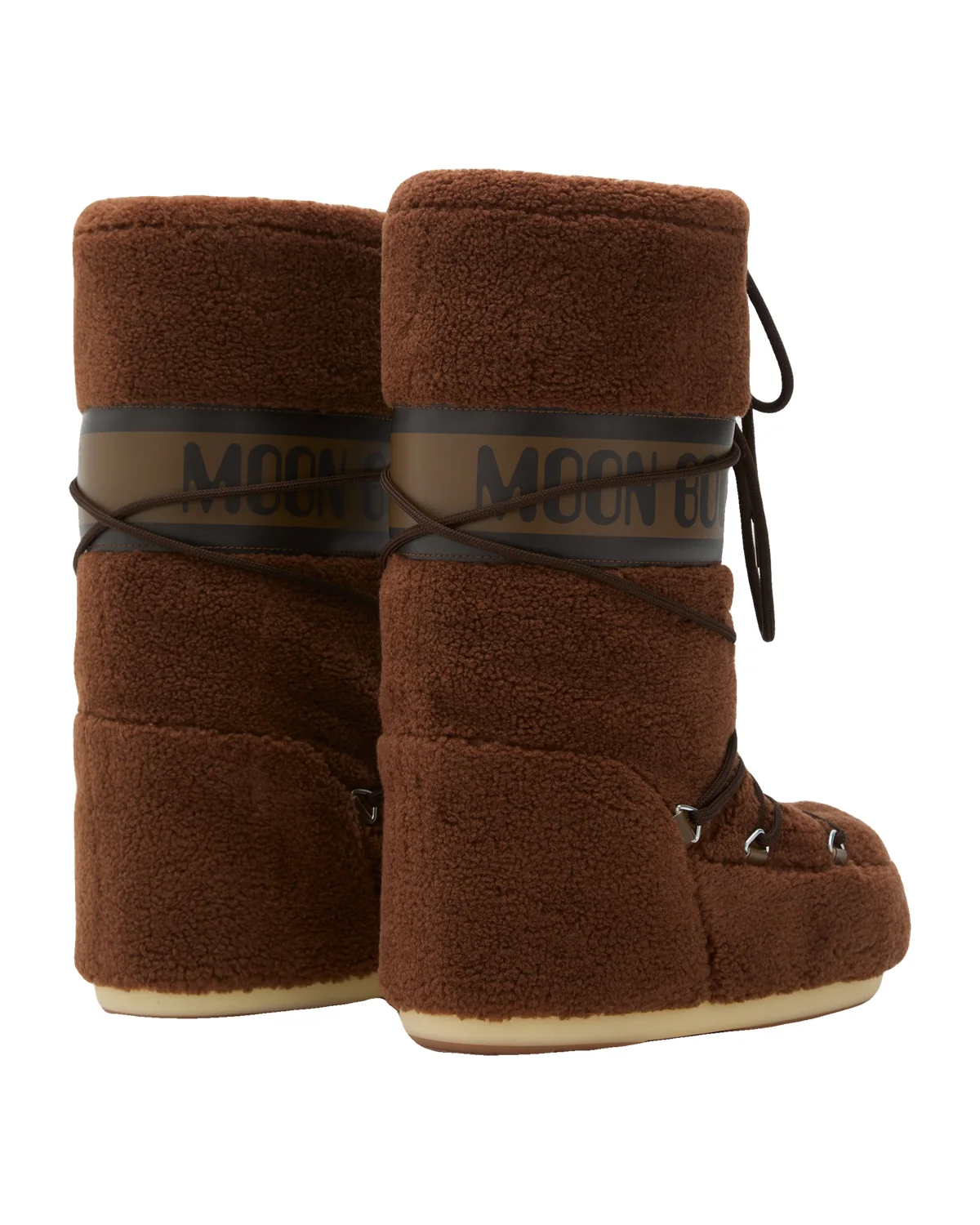 Moon Boot Icon Brown Fleece Boots on a white background, a cold-weather accessory to pair with the best luxury winter coats 2026