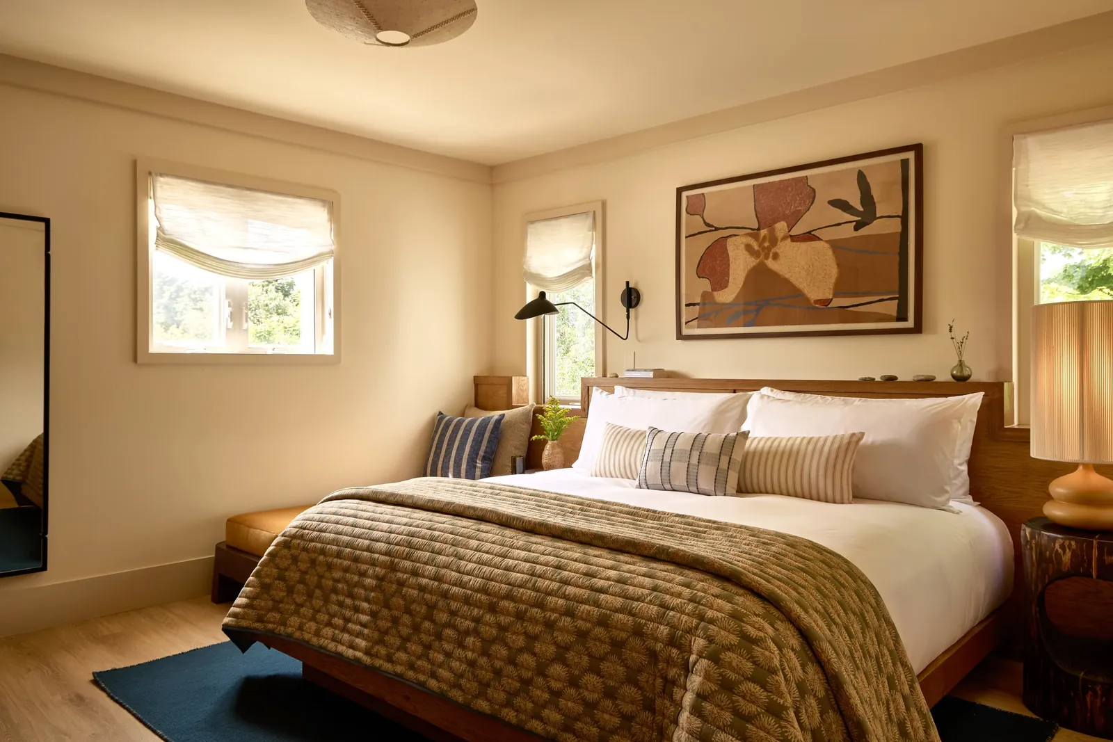 A Corner King guest room at Oyster Estate Greenport with a king bed
