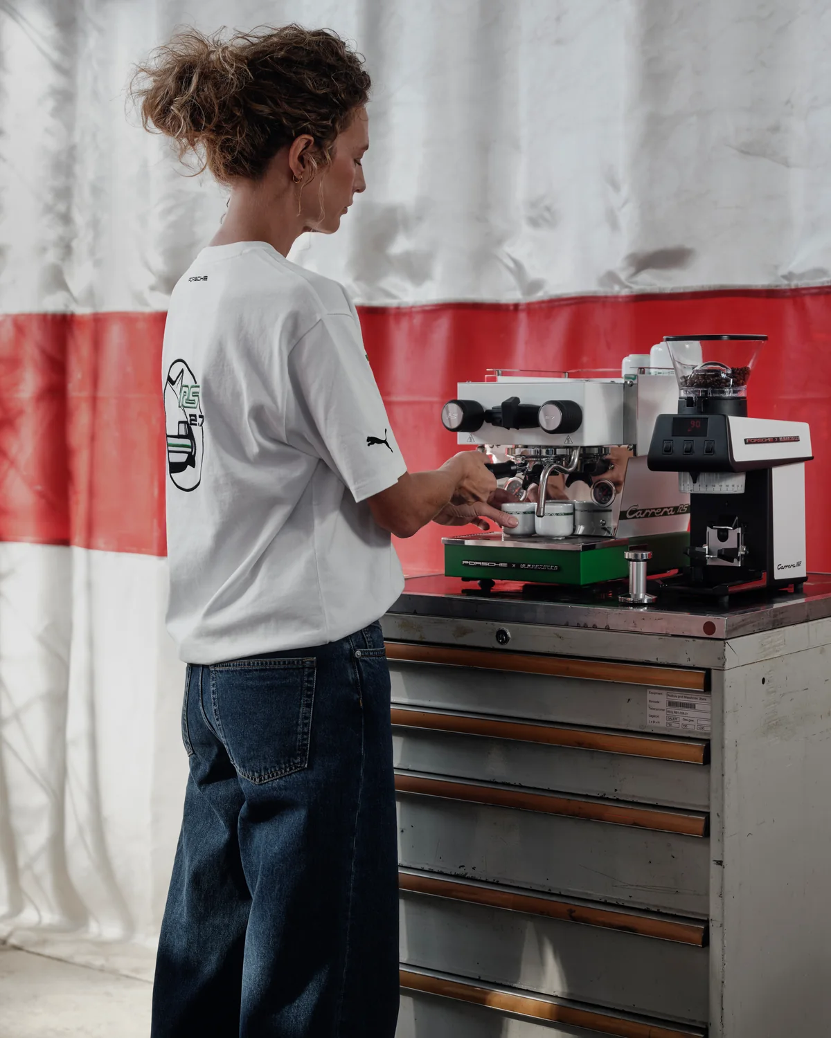 Barista using the Porsche La Marzocco Linea Micra and Pico grinder from the 911 Carrera RS 2.7 Collection