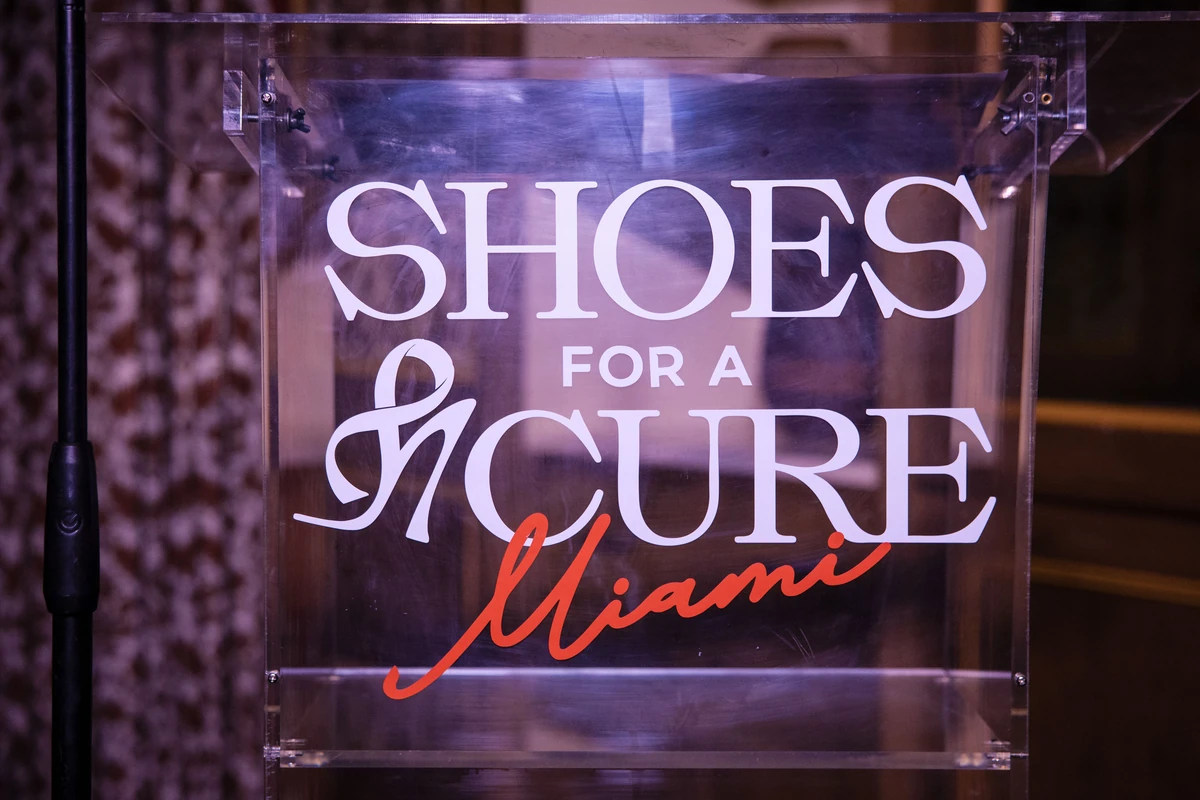 The illuminated Shoes for a Cure Miami sign at the 2026 opening-night dinner at Mother Wolf