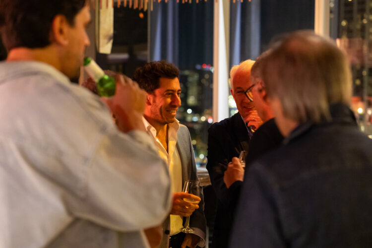 Guests mingle during the evening