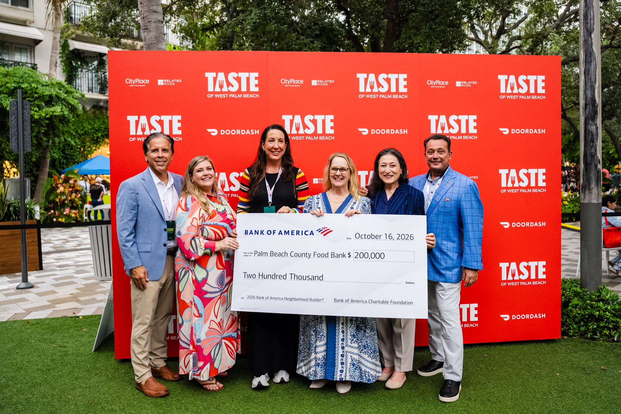 Bank of America presents a $200,000 Neighborhood Builders grant to the Palm Beach County Food Bank at Taste of West Palm Beach