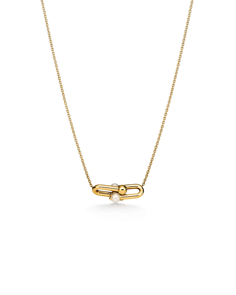 Tiffany HardWear Medium Link Pendant in Yellow Gold with Pearls on a white background