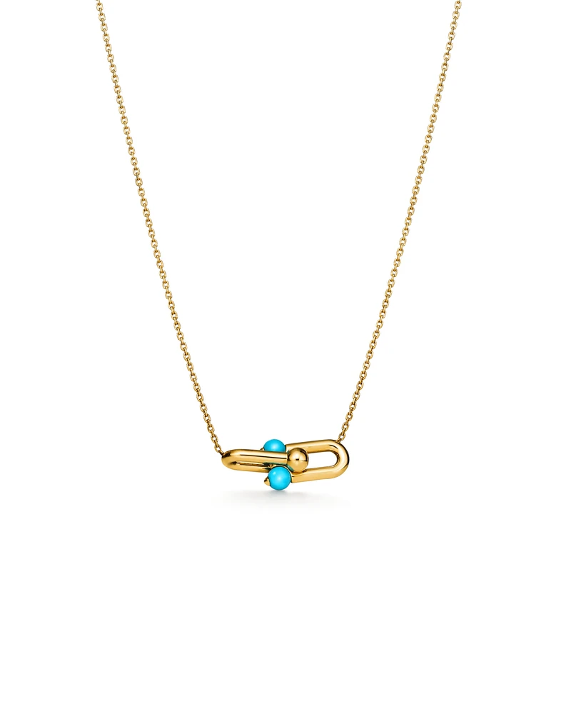 Tiffany HardWear Medium Link Pendant in Yellow Gold with Turquoise on a white background