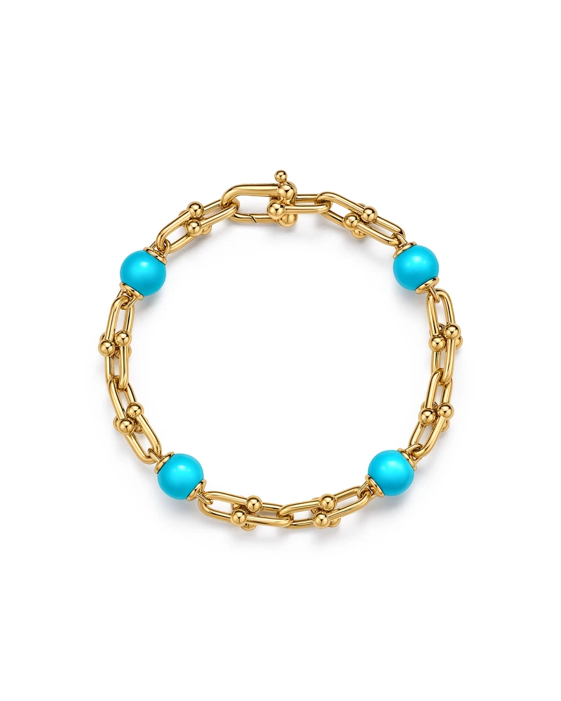 Tiffany HardWear Small Link Bracelet in Yellow Gold with Turquoise on a white background