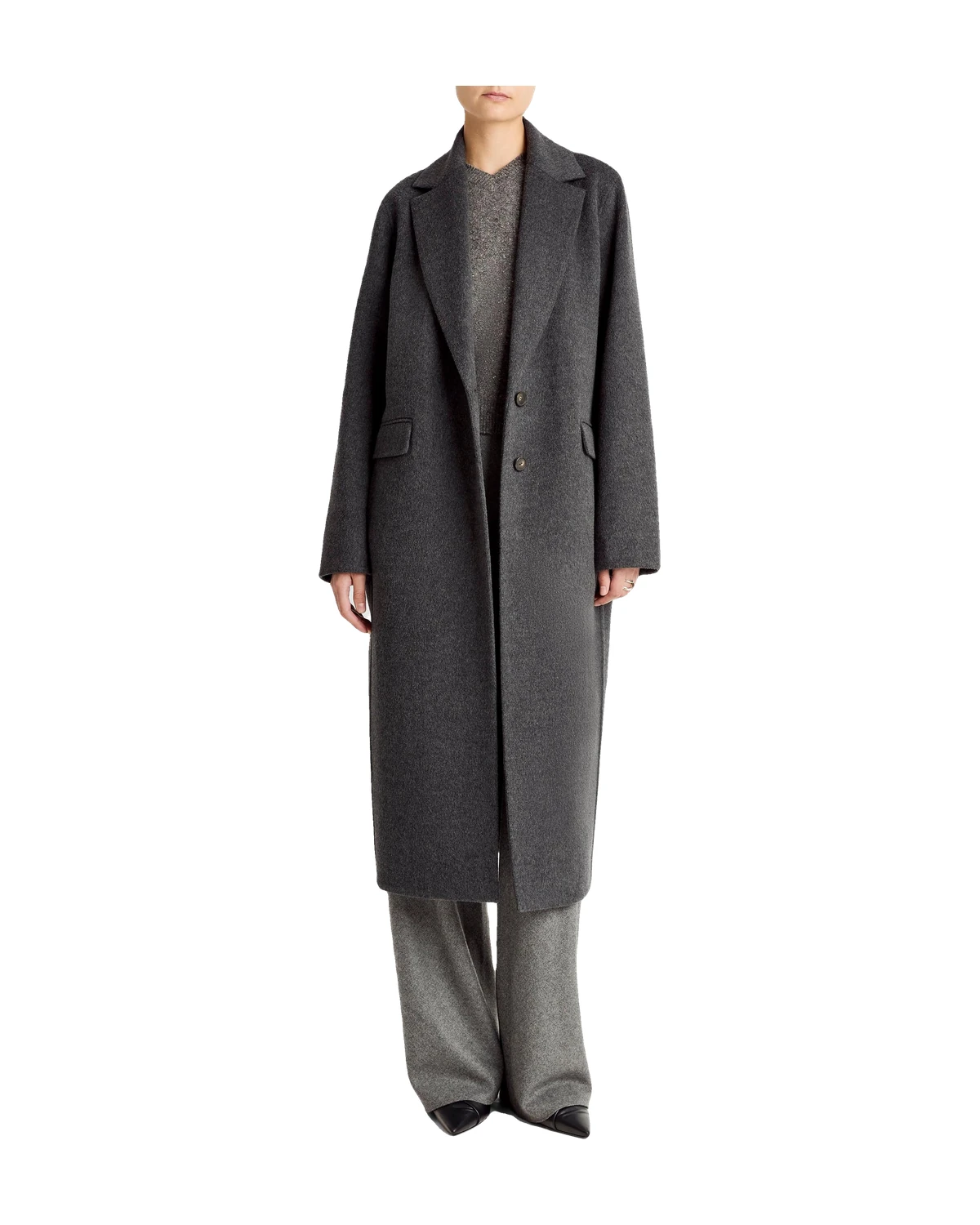 Model wearing the Vince Wool-Blend Single-Breasted Coat in charcoal on a white background, one of the best luxury winter coats 2026